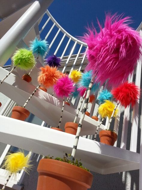 Dr. Seuss inspired Truffula trees The Lorax Trees Diy, Lorax Parade Float, The Lorax Party Decorations, How To Make Truffula Trees, Lorax Trees Diy, Lorax Decoration Ideas, Seuss Christmas Decorations, Dr Seuss Decor, Lorax Trunk Or Treat