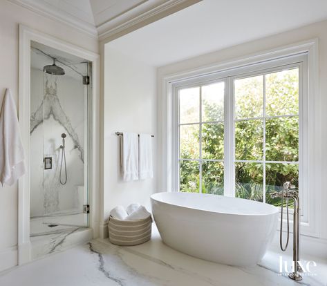 Kohler Tub, Arteriors Chandelier, Peaceful Beach, Spanish Style Architecture, Modern White Bathroom, Mediterranean Style Home, Luxurious Home, Luxe Interiors, Main Bathroom