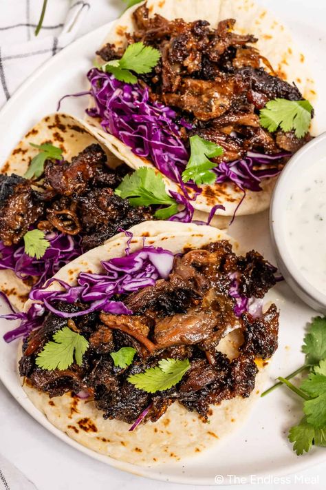 Vibrant tacos meet the rich flavors of oxtail in this incredible oxtail tacos recipe! The meat is seasoned and then slowly braised in a luscious and flavorful sauce until it's fall-apart tender. The deeply savory and succulent oxtail is loaded up onto warm tortillas and contrasted with some simple slaw, crema, and cilantro for the most decadent taco! #theendlessmeal #oxtail #oxtailtacos #tacos #mexican #dinner Oxtail Tacos, Southwestern Food, Lamb Taco, Pork Belly Tacos, Dump Recipes, Hashbrown Casserole Recipe, Oxtail Recipes, Beef Cheeks, Dried Peppers