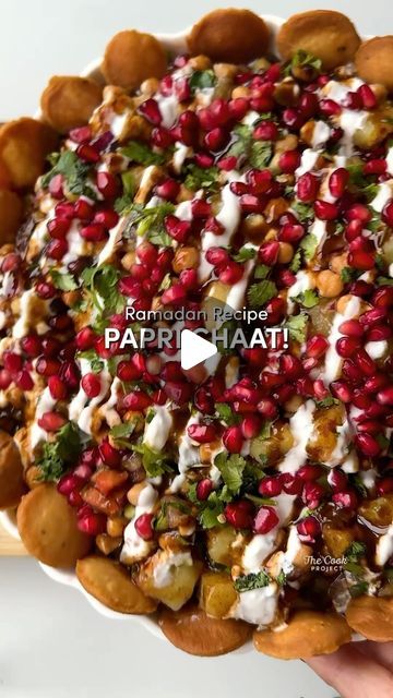 The Cook Project on Instagram: "PAPRI CHAAT!
Spicy, tangy and incredibly good… the ultimate desi street food 🥰. This is the perfect ramadan recipe - it’s quick, easy to make and bursts with flavour! 

What you will need: 
- 2 cans of chick peas
- 1 tsp chilli powder & salt 
- 1 diced onion
- 1 tomato (diced) 
- Diced cucumber 
- Papri 
- 2 boiled and diced Potatoes 
- 1 tsp Chaat Masala
- 4 Tbs Yogurt
- Tamarind/ imli sauce (the more the better!) 👀
- 1 Tsp Mint Chutney
- Coriander 🌿 
- Pomegranate (to garnish)

For the mint chutney:
- Blitz a handful of mint, coriander and two green chillies!" Papri Chaat Recipe, Papri Chaat, Ramadan Recipe, Desi Street Food, Mint Chutney, Chaat Recipe, Chaat Masala, Diced Potatoes, Ramadan Recipes