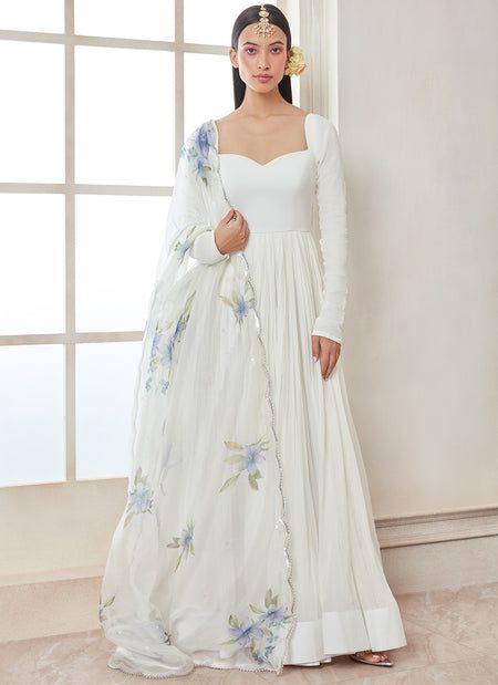 Elegant Cutdana Salwar Kameez Maxi Length, Elegant Maxi Length Salwar Kameez With Cutdana, White Georgette Anarkali Set, Elegant Maxi Length Cutdana Dupatta, White Straight Kurta Dress For Reception, White Georgette Floor-length Anarkali Set, White Floor-length Sharara For Transitional Season, White Semi-stitched Anarkali Set For Transitional Season, Transitional Semi-stitched White Anarkali Set