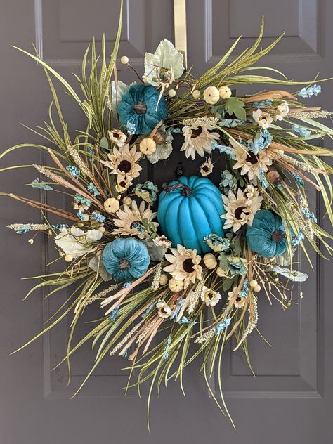 Teal Pumpkin Wreath with three small pumpkins and one large pumpkin in center surrounded by beautiful sword grass and beige sunflowers. Teal Pumpkin Decor, Teal Fall Decor, Teal Pumpkin, Fall Grapevine Wreaths, Fall Swags, Boho Wreath, Autumn Wreaths For Front Door, Statement Decor, Fall Decor Inspiration