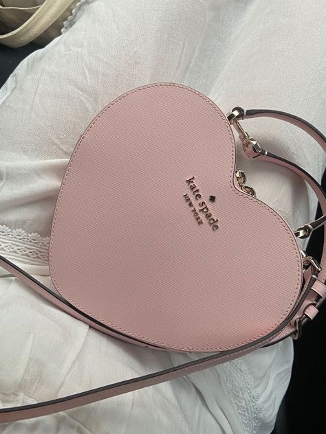 Kate Spade Love Shack Heart Purse, Heart Bag Kate Spade, Kate Spade Pink Heart Bag, Heart Purse Aesthetic, Heart Coach Bag, Cute Pink Bags, Coach Bag Pink, Kate Spade Heart Purse, Kate Spade Heart Bag