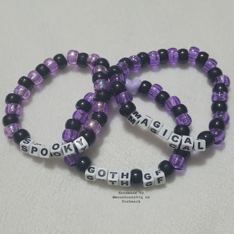 Glittery Black And Purple Pony Bead Bracelet "Magical" Glittery Black And Purple Pony Bead Bracelet "Goth Gf" Black And Holographic Purple Pony Bead Bracelet "Spooky" Double Stranded Elastic Kandi Bracelet Perfect For Emo, Scene, Y2k, Rave, Festival, Goth, Pastel Goth, Egirl, Gamer, Lgbt Pride Aesthetics. Elastic Bracelet Has Fair Stretch. Model Wrist 6.5" Model Hand 7.5" Please Check Measurements For Both. Please Do Not Exceed 8" Width, Elastic Will Break More Sizes Will Be Included Soon. Stock Kandi Bracelets Rave Goth, Matching Word Bracelets, Witchy Friendship Bracelet, Purple Kandi Bracelet, Scene Kid Bracelets, Kandi Bracelets Tutorial, Kandi Bracelets Aesthetic, Pony Bead Bracelets Ideas, Funny Bracelets Beads Words