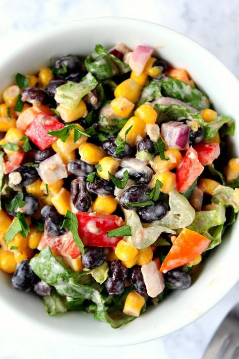 Black Bean Taco Salad Recipe - lighter version of the classic taco salad. Packed with vegetables and black beans in place of chicken for protein. The dressing is simply irresistible! Black Bean Taco Salad Recipe, Recipe Black Beans, Black Bean Taco Salad, Bean Taco Salad, Taco Salad Dressing, Taco Salad Recipe, Black Bean Tacos, Taco Salad Recipes, Vegetarian Tacos