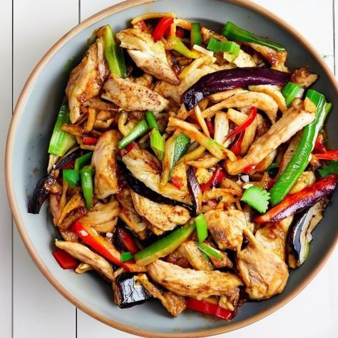 Quick and flavorful chicken and eggplant stir-fry recipe. Tender chicken and silky eggplant, stir-fried in a savory sauce, Perfect for a weeknight dinner. Chinese Chicken And Eggplant Recipes, Eggplant Recipes Chicken, Eggplant And Chicken Recipes, Chicken And Eggplant, Eggplant Stir Fry, Chicken Eggplant, Thai Eggplant, Chinese Eggplant, Egg Plant