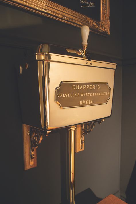 Thomas crapper brushed brass cistern against a black background Gothic Bathroom Ideas, Art Nouveau Bathroom, Washroom Ideas, Thomas Crapper, Gothic Noir, Victorian Toilet, Gothic Bathroom, Private Museum, Downstairs Loo