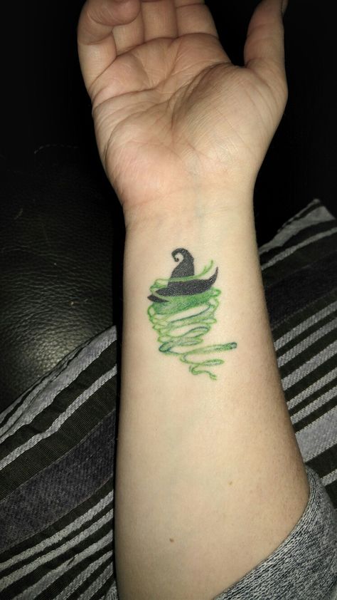 Wicked Witch of the West tattoo Wicked Musical Tatoos, Wicked Defying Gravity Tattoo, Wicked Movie Tattoo, Wicked Musical Tattoo Ideas, Defying Gravity Tattoo, Wicked Tattoo Designs, Wicked Witch Tattoo, Wizard Of Oz Tattoo Ideas, Elphaba Tattoo