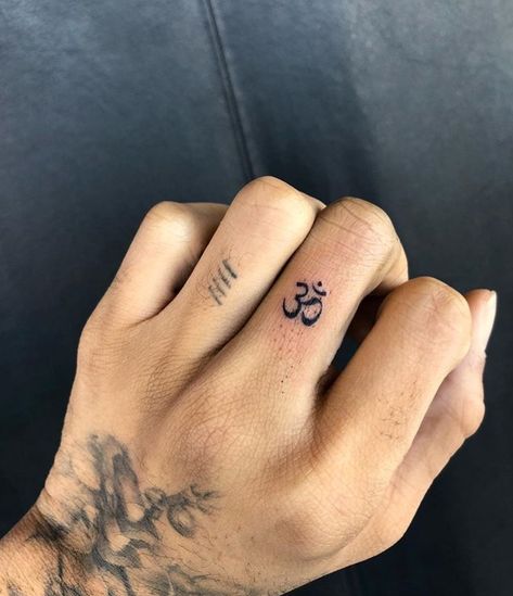 OM Tattoo 🕉 hand tattoo, finger tattoo Om Tattoo Designs, Om Symbol Tattoo, Luck Tattoo, Om Tattoo Design, Finger Tattoo For Women, Om Tattoo, Hand Tattoos For Women, Spiritual Tattoos, Finger Tattoo