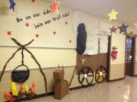 Western Theme Door Decorating Ideas, Western Bulletin Board Ideas, Western Hallway Decor School, Western Theme Classroom Door, Western Classroom Theme, Western Theme School Hallway, Wild West Homecoming Float, Western Classroom Transformation, Western Bulletin Boards