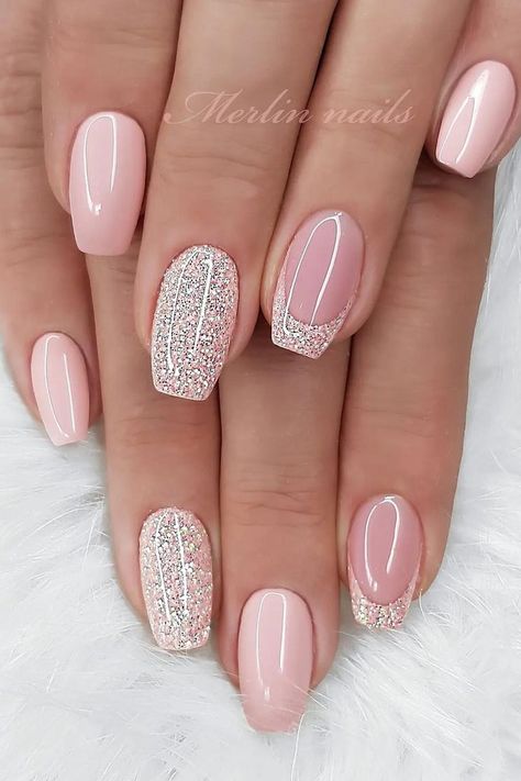 These ballerina nails feature a soft pink base, exuding a touch of elegance. Complementing the delicate color are two nails fully encrusted with sparkling pink glitter, adding a dash of glamour to the overall look. The glossy finish on the pink base nails and the textured glitter make for a sophisticated manicure perfect for any occasion.  // Photo Credit: Instagram @merlin_nails Nails Shimmer Sparkle, French Nail Designs Ballerina, Blush Pink And Silver Nails, Pink Ombre Shellac Nails, Pink Elegant Nails Classy, Soft Pink Ballerina Nails, Ballerina Nails Short Summer, Short Gel Nails With Glitter, Pink And Silver Sparkle Nails