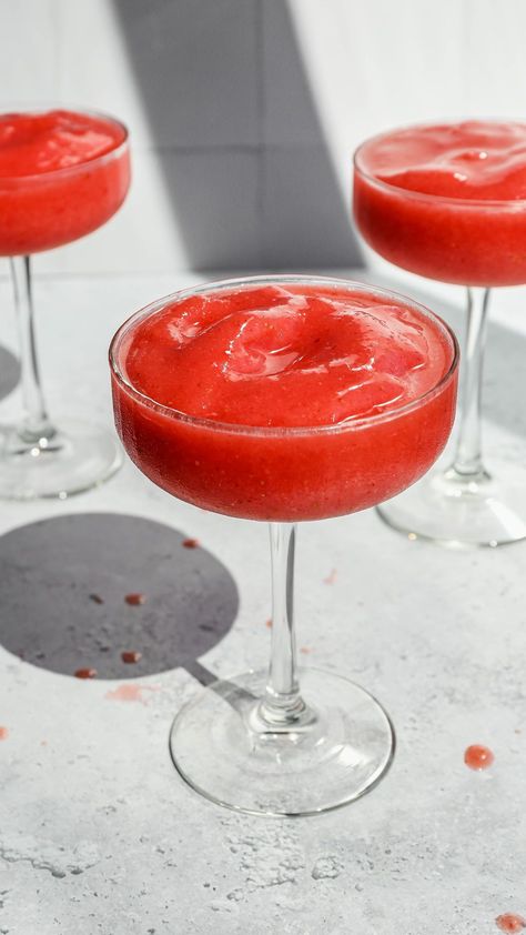 This easy recipe for strawberry daiquiri mocktails is the perfect summer drink. It's a non alcoholic frozen drink with lots of strawberry flavor. This simple virgin version is fruity, delicious and great for kids or adults. Pina Colada Mocktail, Hot Chocolate Treats, Strawberry Simple Syrup, Day Cocktails, Dragon Fruit Smoothie, Frozen Drink, Perfect Summer Drink, Blueberry Syrup, Make Simple Syrup