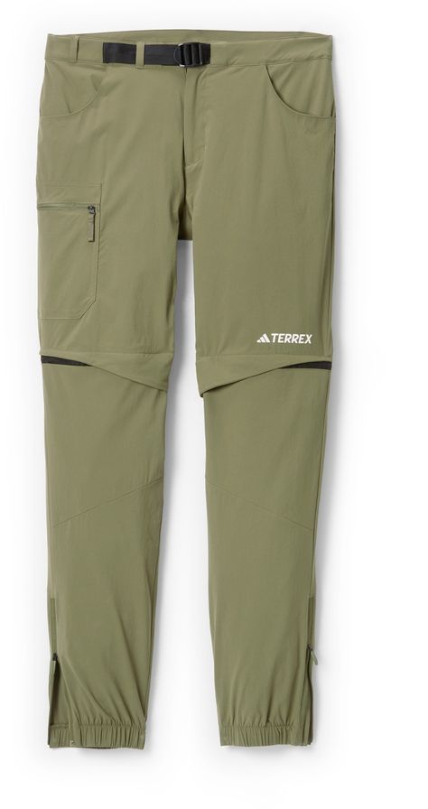 When every ounce in your pack counts  adidas Utilitas Zip-Off men's hiking pants can pull double duty. Their stretch-woven fabric sheds water and dries fast  offering flexible comfort on the trail. Outdoor Pants, Fleece Sweatpants, Hiking Pants, Sports Wear, Mens Joggers, Athletic Apparel, Rei Co-op, The Trail, Sport Wear