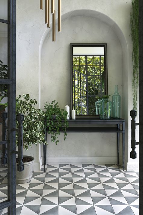 Herringbone tile floor entryway