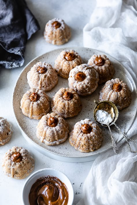 Mini Bundt Cake Packaging Ideas, Mini Cinnamon Roll Bundt Cakes, Mini Cinnamon Bundt Cakes, Fall Mini Bundt Cakes, Christmas Mini Bundt Cake Recipes, Mini Christmas Bundt Cakes, Christmas Mini Bundt Cakes, Mini Bundt Cakes Christmas, Mini Bundt Cake Ideas