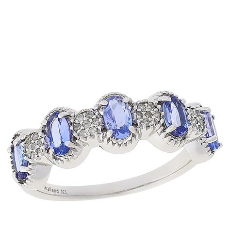 Colleen Lopez Tanzanite and Diamond 5-Stone Sterling Silver Ring  Five oval-cut tanzanite float across this sterling silver band, with round diamond accents for extra sparkle.        Approx. 5/16"L x 1/8"H; shank 1/16"W     Stamped .925 sterling silver; rhodium plating   Stone Information       All sizes and weights approximate     Total Carat Weight: 1.08ctw     Tanzanite - Oval; 1ctw     White Diamond - Round; 0.08ctw; Color: H-I, Clarity: I2 Tanzanite Stone, Tanzanite Diamond, Sterling Silver Bands, Silver Band, White Diamond, Oval Cut, Round Diamond, Sterling Silver Ring, Round Diamonds