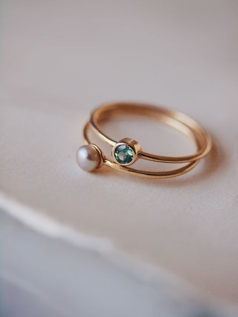 Two simple stacking rings on thin gold bands, one small white and lustrous pearl and one bezel set Alexandrite. Pearl Ring Designs Unique Gold, Baby Rings Gold, Pearl Ring Designs, Sapphire Ring Designs, Modern Gold Ring, Small Earrings Gold, Modern Gold Jewelry, Jewelry Set Design, Single Pearl