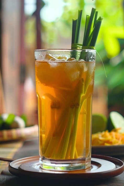 Authentic Thai Lemongrass Tea Recipe (Hot, Iced Tea & Cocktail) Lemongrass Tea Recipe, Candles Project, Lemon Grass Tea, Thai Tea Recipes, Lemongrass Recipes, Hot Tea Recipes, Iced Tea Cocktails, Pandan Leaves, Tea Cocktail