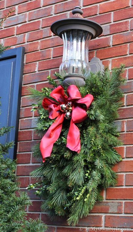 How to Make and Decorate with Holiday Greenery To Hang Over an Outdoor Light | In My Own Style Holiday Greenery, Porch Light, Diy Porch, Christmas Porch Decor, Cheap Christmas, Christmas Greenery, Christmas Porch, Chicken Wire, Front Porch Christmas Decor