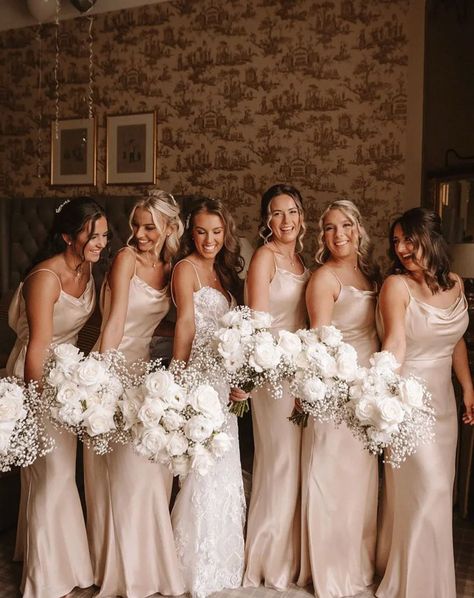 3 reasons why champagne bridesmaid dresses are so classy ✨ Neutral wedding palettes are HUGE for 2025 and It’s no secret that we love this colour palette. We’re talking about all those yummy, delicious Champagne, Gold and Creamy colours which work beautifully, especially in satin fabrics. Here’s our 3 reasons why you should look to a neutral palette and consider champagne as your bridesmaid colour… ✨ It’s easy to wear. There are various shades, from nude, to gold, to metallic. Therefore, ... Light Gold Satin Dress, Champagne Colour Theme Wedding, Champagne Wedding Colors Palette, Champagne Colour Bridesmaid Dresses, Champagne Colour Palette Wedding, Creamy Neutral Wedding, Neutral Champagne Bridesmaid Dresses, Bridesmaid Colour Palette, Champagne Color Palette Wedding Colour Schemes