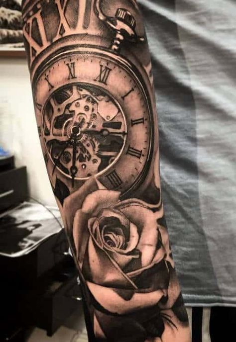 This tattoo is an image of a large clock sitting on a rose. The clock is slanting to the right and is pointing at 2:30. The clock is numbered in Roman numerals. Pocket Watch Tattoos, Tattoo Man, 2 Tattoo, Clock Tattoo Design, Tattoo Trend, Pocket Watch Tattoo, Marvel Tattoos, Tattoo Inspiration Men, Skeleton Hand Tattoo