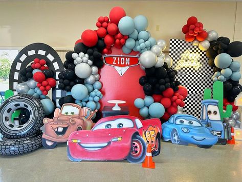 Ka-Chow! Disney Cars themed birthday party. 🏁🏁🏎️⚡️ Been awhile since i last used our custom painted Cars standees. Glad we were able to us… | Instagram Custom Painted Cars, Disney Cars Theme Birthday Party, Cars Themed Birthday Party, Disney Cars Birthday Theme, Disney Cars Theme, Ka Chow, Pixar Cars Birthday, Cars Birthday Party Decorations, Wiggles Birthday