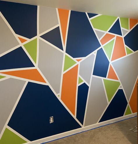 Boys accent wall idea Geometric Room Paint, Diy Geometric Wall Paint Bedrooms, Geometric Accent Wall Paint, Big Kid Room Boy Bedrooms, Geometric Painted Accent Wall, Kids Room Accent Wall Boy, Modern Geometric Wall Paint, Wall Painting Ideas Bedroom Boys, Boys Bedroom Accent Wall Ideas