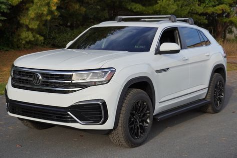 VW Atlas Cross Sport, Lifted, roof rails, all terrain tires and Romik RPD running boards. Ready for the long weekend and capable to go anywhere. Check them out at www.Romik.com #VWAtlas #VWAtlaslifted @VW Atlas Enthusiasts @VWAtlasSport #VWAtlascrossSport Vw Atlas Cross Sport, Atlas Cross Sport, Vw Atlas, All Terrain Tires, Volkswagen Atlas, Black Suit Men, All Terrain Tyres, Roof Rails, Vw Volkswagen