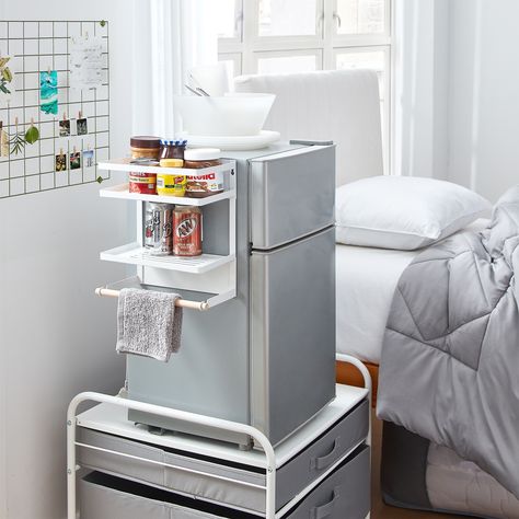 Features: Versatile shelving unit to maximize space in college dorm rooms, office breakrooms, and small kitchens Strong magnets on the back adhere shelves to your refrigerator, freezer, or compact mini fridge Wooden dowel holds paper towel for quick and… Dorm Kitchen Essentials, Dorm Closet Organization, Dorm Room Setup, Dorm Needs, Dorm Cooking, Dorm Fridge, Small Dorm Room, Small Dorm, Dorm Supplies