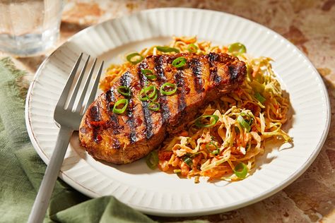 Chili crisp pork chops and kimchi slaw is a bold 30-minute meal Kimchi Slaw, Fried Bologna, Chili Crisp, Leftover Pork, Slaw Recipe, Pork Loin Chops, Fermented Vegetables, Pork Cutlets, Slaw Recipes