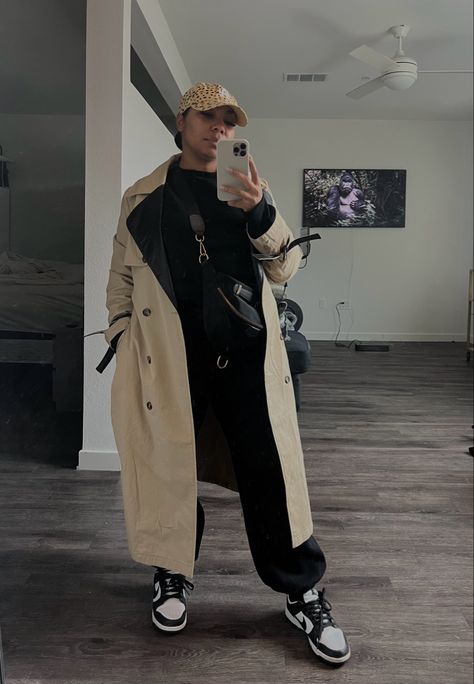 Sweat Pants Trench Coat Outfit, Sweats And Trench Coat Outfit, Monochrome Trench Coat Outfit, Tracksuit And Coat Outfit, Sporty Trench Coat Outfit, Edgy Trench Coat Outfit, Airport Outfit Trench Coat, Long Coat With Hoodie Outfit, Sweatsuit And Trench Coat