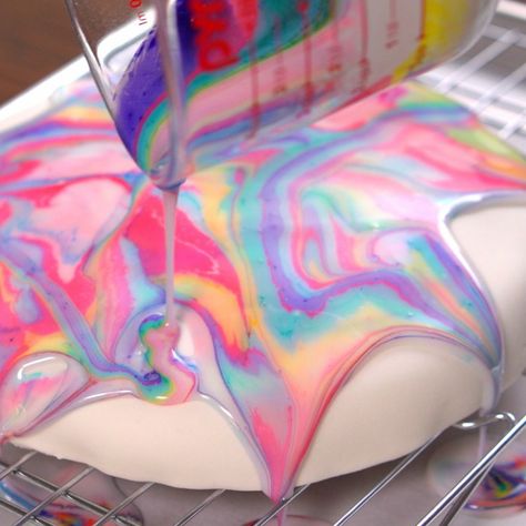 If you love to watch paint being mixed, you will be mesmerized by the blending of these beautiful food coloring! This cake is almost too beautiful to eat. Tie Dye Frosting, Tye Dye Cake, Poured Icing, Tie Dye Birthday Party, Pear And Almond Cake, Neon Food, Rainbow Frosting, Decorate A Cake, Glaze For Cake