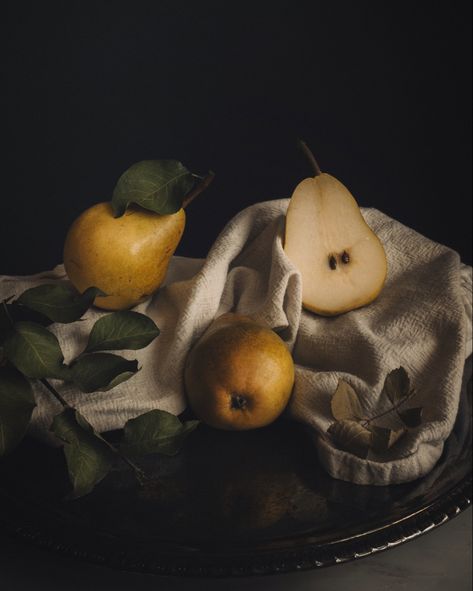 Still life photograph of three pears on linen cloth and silver platter Still Life Pictures Photographs, Dark Still Life Photography, Celestial Writing, Moody Still Life Photography, Modern Still Life Photography, Fruit Still Life Photography, Dark Still Life, Pear Photography, Pear Still Life Photography