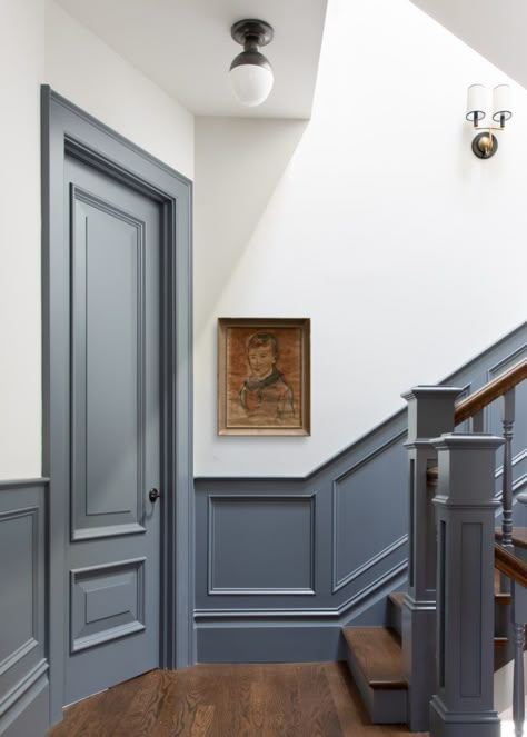 Dark Blue Stairway, Dark Painted Wainscoting, Blue Trim And Doors, Dark Entrance Hall Ideas, Dark Painted Trim, Dark Trim Interior, Painted Trim And Doors, Updated Victorian Interior, Trim Paint Color Ideas