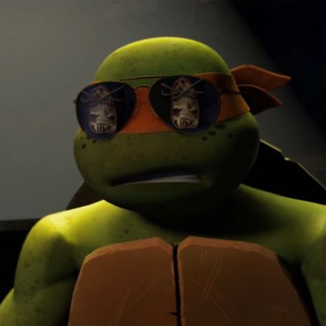 Michelangelo worlds cutest interrogator Michel Angelo Ninja Turtle, Teenage Mutant Ninja Turtles Michelangelo, Mikey Icon Tmnt, Michelangelo Tmnt Pfp, Michaelangelo Tmnt Pfp, Michaelangelo Tmnt 2012, Michelangelo Tnmt, 2012 Michelangelo, Michelangelo Tmnt 2012