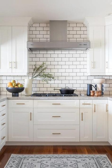 White Kitchen Subway Tiles with Dark Gray Grout - Transitional - Kitchen Subway Tile With Dark Grout, Tile With Dark Grout, White And Gold Nightstand, White Subway Tile Kitchen, Dark Grout, Grey Geometric Rug, Gray Grout, Pink And Green Wallpaper, Top Kitchen Cabinets