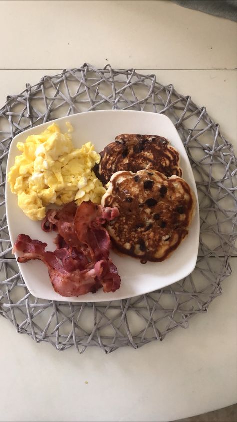 chocolate chip pancakes, scrambled eggs, & bacon Scrambled Eggs Bacon, Pancakes Bacon, Eggs And Toast, Eggs And Bacon, Pancakes And Bacon, Bacon Eggs, Chocolate Pancakes, Chocolate Chip Pancakes, Healthy Sweets Recipes