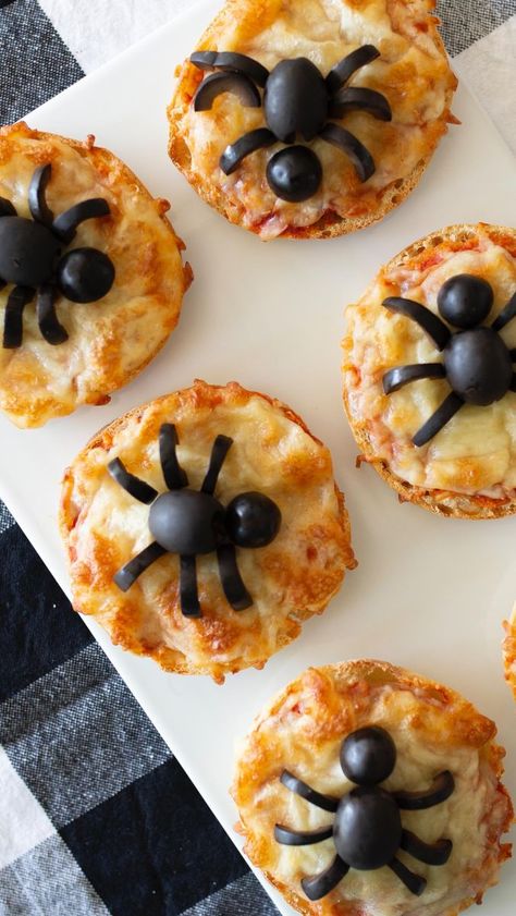 9.8K views · 448 reactions | 4 INGREDIENT OLIVE SPIDER MINI PIZZA’S! Whether you’re serving dinner or need a Halloween appetizer recipe, Charlie and I got you covered! You can easily make this recipe in under 20 minutes! All you need is English muffins, tomato sauce, mozzarella cheese and black olives. How cute are these pizzas?! Bake in the oven @ 450 for about 8 minutes. #easyrecipes #halloween #halloweenideas #halloweentreats #halloweenfood | Melissa Johnson | bestfriendsforfrosting · Ori Muffins Halloween, Halloween Appetizer, English Muffin Pizza, Individual Pizzas, Halloween Food Appetizers, Pizza Muffins, Happy Haunting, Halloween Appetizers, English Muffins