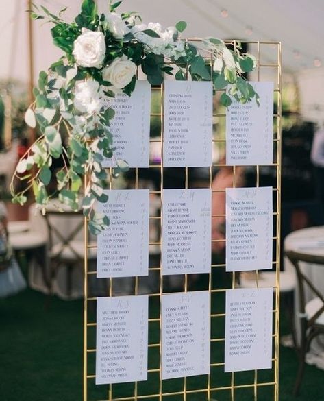 Your Perfect Day weddings on Instagram: "Seating charts can be a pain in the a$$⁠ One way to make it a little easier is print each list on a 5X7 card stock. You can attach the card stock on to our gold grid (we provide the clips). This way, if one of your guests calls you the week of the wedding and can not longer attend, you just remove that card and replace it with an updated one." Wedding Chart, Wedding Table Signage, Wedding Trellis, Seating Wedding, Table Chart, Purple And Gold Wedding, 2025 Wedding, Wedding Clip, Wedding Table Plan