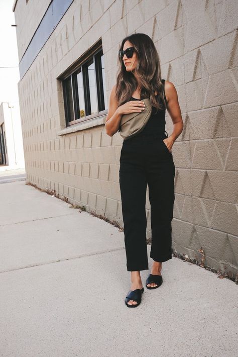 ashley wearing a black bodysuit, black straight leg cropped pants, black crossover sandals, and olive belt bag worn over the shoulder; a sage green brick wall in the background Chic Mom Outfits, Stylish Mom Outfits, Mom Outfits Spring, Trendy Mom Outfits, Casual Mom Style, Laid Back Outfits, Casual Outfits For Moms, Summer Outfits For Moms, Trendy Mom