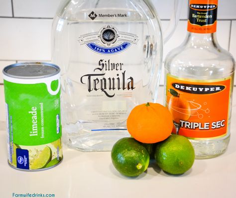 Limeade margaritas are the sweet blend of three easy ingredients to make easy margaritas by the pitcher by mixing together a can of frozen limeade, triple sec, and tequila. Margaritas Made With Limeade, 3 Ingredient Margarita, Best Large Batch Margarita Recipe, Big Batch Margarita Recipe With Limeade, Margaritas By The Pitcher, Margarita Recipes Using Frozen Limeade, Margaritas With Frozen Limeade, Margaritas By The Gallon, Pitcher Margarita Recipe Limeade