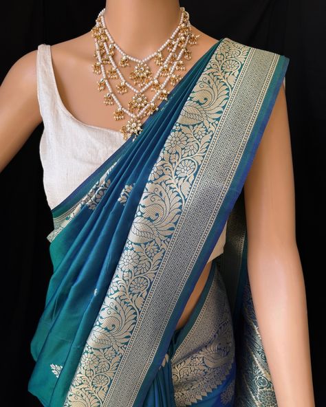 Peacock blue Art silk saree with contrast golden zari border and design all over saree. Comes with running blouse. Find this saree in our website: Www.thejacouture.in > silk sarees> peacock blue art silk saree. #silksarees #peacockbluesaree #artsilk #sareeslove #silk Peacock Blue Saree, Blue Saree, Art Silk Sarees, Peacock Blue, Blue Art, Silk Saree, Silk Sarees, Saree, Running