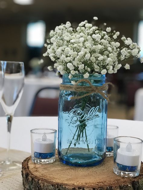 Beach Mason Jar Centerpieces, Blue Mason Jars Centerpiece, Tea Light Mason Jar Centerpiece, Wedding Centerpieces Light Blue, Blue Mason Jar Wedding, Simple Wedding Table Decor Reception Ideas Mason Jars, Blue Mason Jar Wedding Centerpieces, Blue Ball Jar Centerpieces, Blue Glass Centerpieces