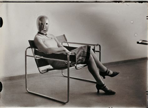 Erich Consemüller, "Untitled (Woman in B3 club chair by Marcel Breuer wearing a mask by Oskar Schlemmer and a dress in fabric designed by Lis Beyer)." c. 1926 Marcel Breuer Wassily Chair, Oskar Schlemmer, Herbert Bayer, Wassily Chair, Moholy Nagy, Metal Workshop, Ludwig Mies Van Der Rohe, Bauhaus Art, Walter Gropius