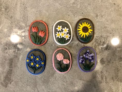 Polymer clay pendants or ornaments. Tulips, daisies, sunflower, forget-me-nots, carnations, and lavendar. Polymer Clay Pendants, Clay Pendants, Forget Me Nots, Floral Collection, Polymer Clay Pendant, Dry Clay, Air Dry Clay, Air Dry, Tulips