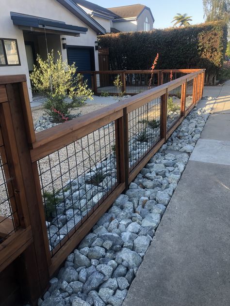 Fence w/ rough stone border and gravel mulch Rock Fence Ideas, Rock Fence, Backyard Planters, Dog Backyard, Fence Design Ideas, Stone Fence, God Provides, Duck House, Living Garden