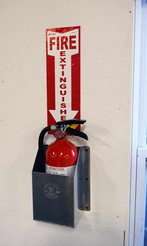 Always a good idea to have safety equipment in a safe place when working with machinery and tools. Store your extinguisher in a custom fit cabinet in an easily accessible spot. Mounts to your wall or secure to the floor in your garage, shop or trailer. Holds a 5 LB bottle. Dimensions: Inside diameter of cabinet is 5 ¾"W x 4 ½"D Dimensions:  11"H x 7.5"W x 4.75"D http://www.pitpal.com/holders/fire-extinguisher-holder-5-lb/ Fire Extinguisher Box Design, Fire Extinguisher Box, Fire Extinguisher Cabinets, Warehouse Project, Fitted Cabinets, Emergency Equipment, Visual Communication Design, Fire Extinguishers, A Safe Place