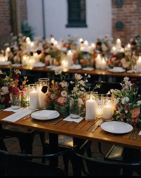 Wedding Dining Tables, Long Table Wedding Tablescape, September Florals Wedding, Fairy Lights Wedding Reception Indoor, Curved Table Wedding, Earthy Wedding Aesthetic, Long Wedding Tables With Candles, Wedding Table Candles And Flowers, September Wedding Aesthetic