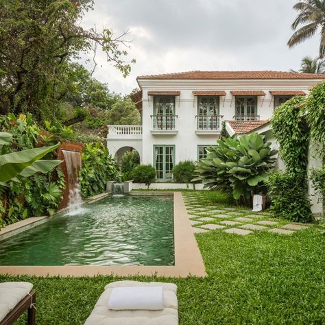 This charming villa in Goa has a lush courtyard, a bio-filtered pool, and an abundance of skylights | Architectural Digest India White Foyer, Indoor Courtyard, Charming Kitchen, Popular Decor, Scandinavian Decor, Indoor Outdoor Living, Architectural Digest, Luxury Real Estate, Goa