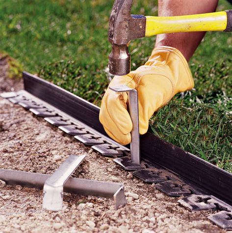 pounding-stakes-walkway-border-b03d0b52 Diy Stone Walkway, Paver Walkway Diy, How To Lay Pavers, Paver Edging, Flagstone Pathway, Gravel Walkway, Flagstone Pavers, Wood Walkway, Flagstone Walkway